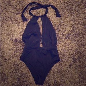 ASOS plunging neckline one piece swimwear.